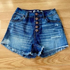 Medium wash slightly distressed high rise shorts